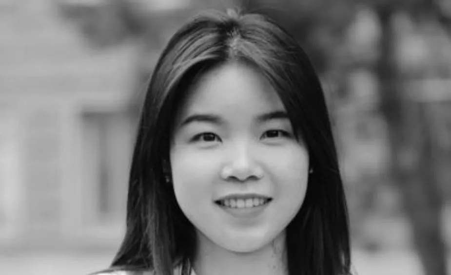 A black and white photo of a woman.