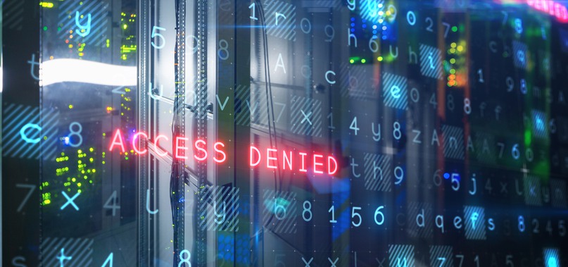 Bild på datorskärm med olika tecken och texten "Access Denied"